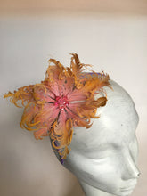 Load image into Gallery viewer, Pink and yellow feather flower with net on a lilac silk headband.