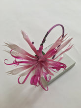 Load image into Gallery viewer, Pink recycled plastic flower on a silk covered metal headband.