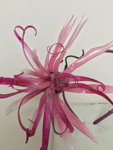 Load image into Gallery viewer, Pink recycled plastic flower on a silk covered metal headband.